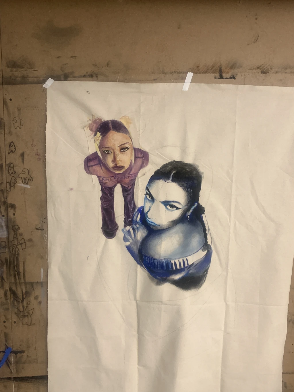 Large fabric portrait painting of two figures viewed from above
